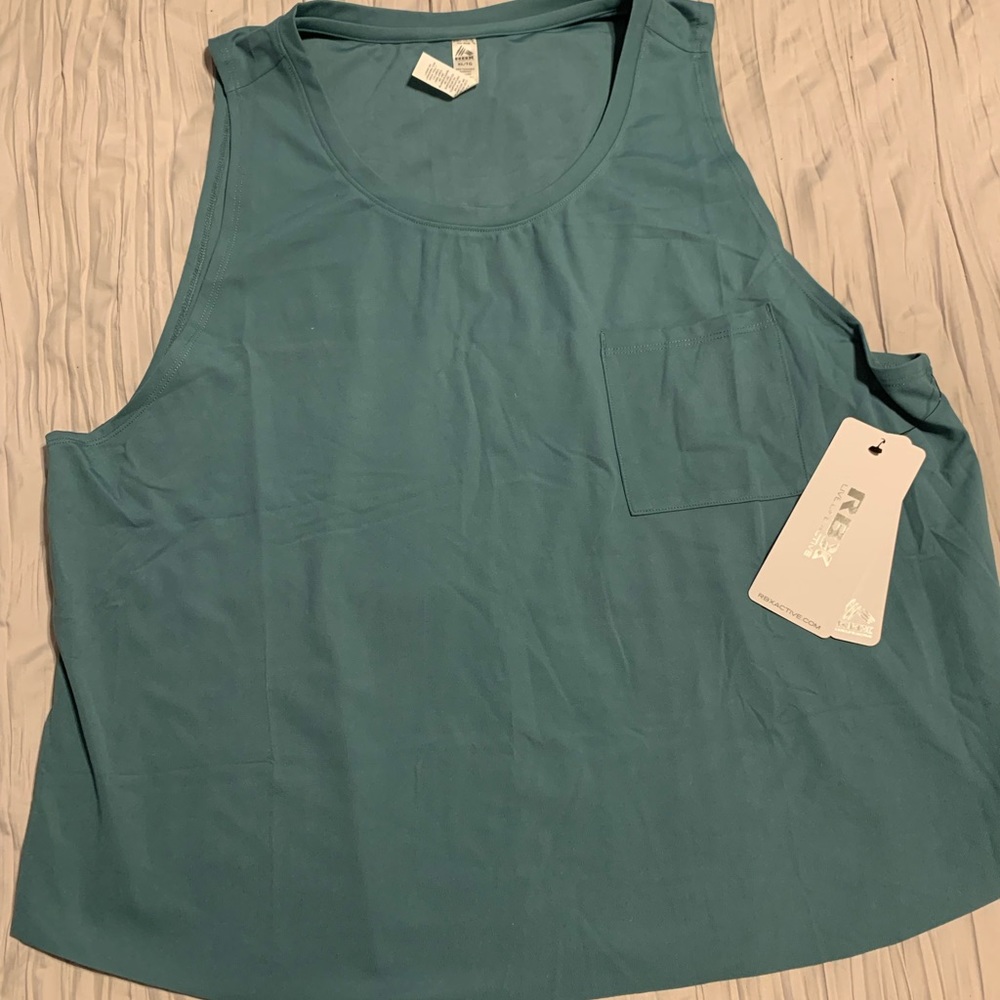 Reebok women’s workout tank. Size XL. Brand new with tags.